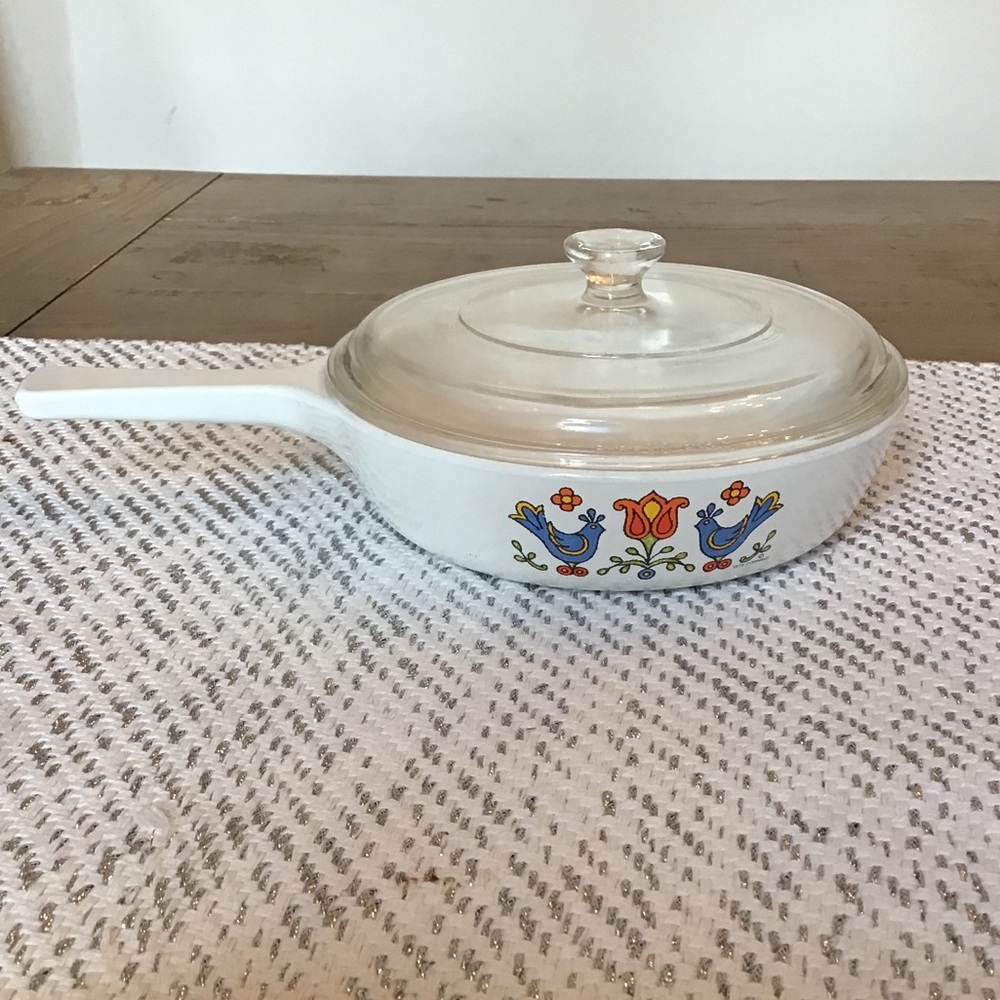 Vintage CorningWare Country Festival skillet with a lid